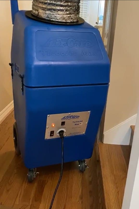 Air-Care TurboJet Max negative-air machine set up in a home