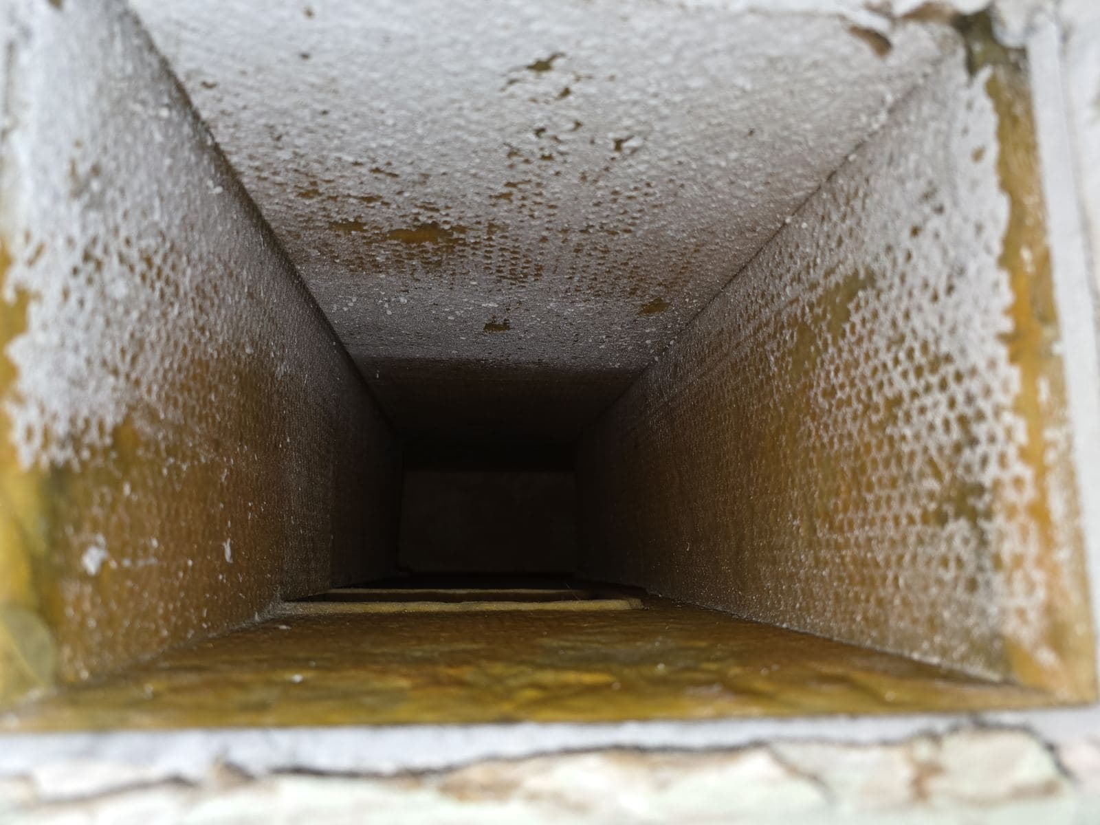 Dusty supply duct with the cover removed