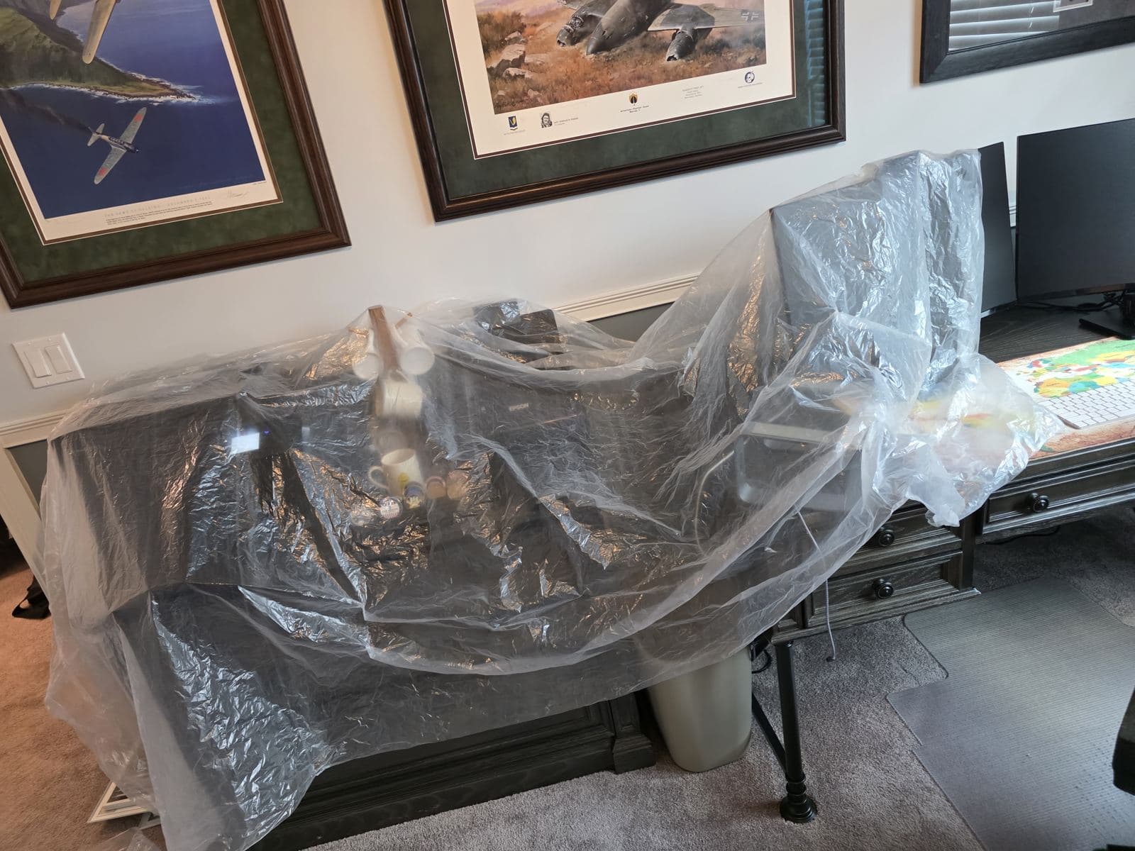 Furniture covered in plastic before duct cleaning
